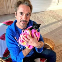 awwww-cute:  A rare photo of Tony Stark with