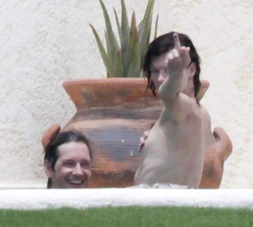 toplessbeachcelebs:  Milla Jovovich (Actress) in a jacuzzi topless in Los Cabos (August 2011)