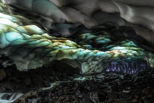 nubbsgalore:this ice cave on the kamchatka peninsula in russia was formed by a stream flowing beneat