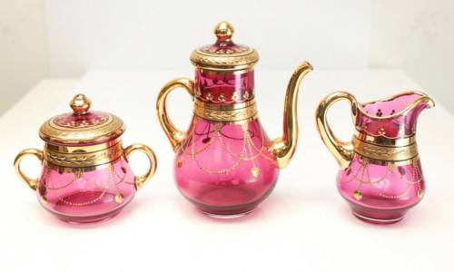 designobjectory:Bohemian Cranberry red and gilt glass tea service for 6, circa 1970. Gilt gadroon sw