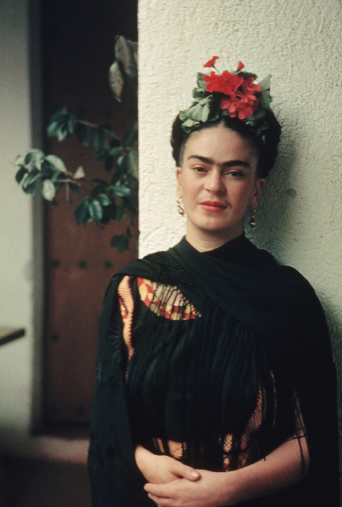 vintagegal:My painting carries with it the message of pain.” Frida Kahlo. Photo by Nickolas Muray 