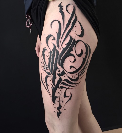 Abstract calligraphy Tattoo.