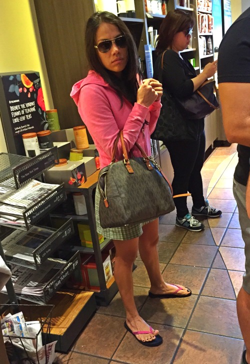 Sexy Latina&rsquo;s face, body and pretty feet in flip flops candid shot at the coffee shop! Very su