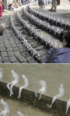 Awesome Art Installation With Hundreds Of Little Frozen Men, Left Out To Melt In