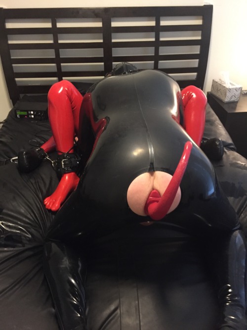 rbrlover:   Then a sexy rubber pup joined in to help use the rubber toy. The pup found a hole to burry his thick pup meat and make the blinded rubber toy moan and scream 
