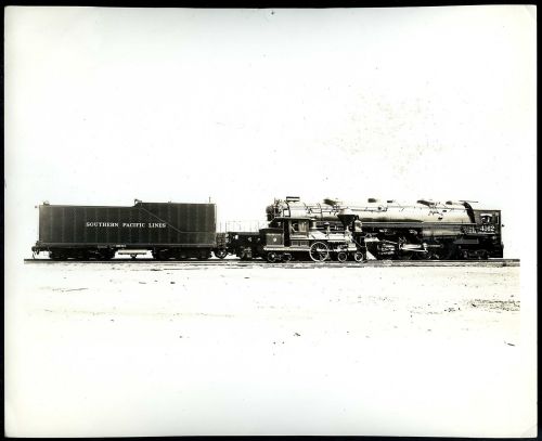 Portrait of AC-7 class Cab-Forward No. 4162 next to the diminutive SP No. 1 the C.P. Huntington.&nbs