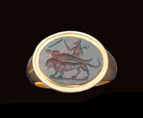 Graeco-Egyptian intaglio of mummified Osiris being carried on the back of lion with Anubis in the ba