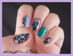 cheshirecatsmile37art:  kittyklawz:  Madii on my nails from @cheshirecatsmile37art. Yay Colors!  I’m not sure you can tell, but the quality of the photo has gotten better compare to my old Nail art. I also have a light box now to take color accurate