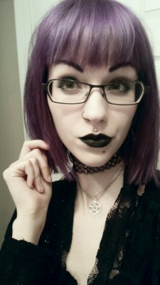 graveyard-whimsy:  Hair is now *dark* purple, and I got a new stud for my medusa c: