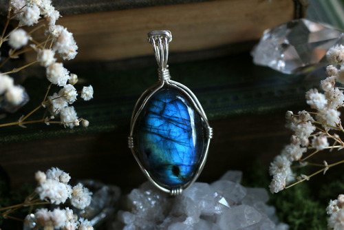 All these beautiful wire wrapped sterling silver labradorite pendants are available at my Etsy Shop 