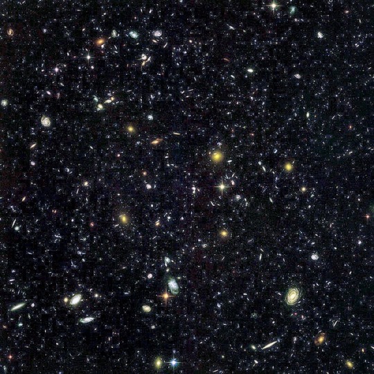 diamondrosegalaxy:  This is a picture taken in a patch of sky about the size of your thumb nail. All of those, even the ones that look like individual stars, are galaxies. 