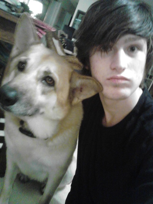 just me and my accidentally floppy emo haircut and my dog chillin out no big deal smooch smooch