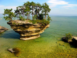 stunningpicture:  Stunning Turnip Rock, Eroded by water over the course of thousands of years, this free standing rock is located in Lake Huron - Port Austin, Michigan (Unknown photographer) [1024×768].