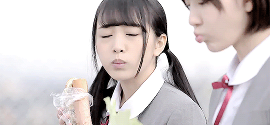 akb48g-gifs:  Mion eating with Sakura-tan and judging her for eating a piece of cabbage