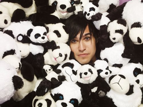 underthe-corktree:  there is literally a picture of pete wentz doing anything riding a clothing rack?  being hannibal lectur at a fashion show?  freddy kruger with a fedora?  laying with pandas?            