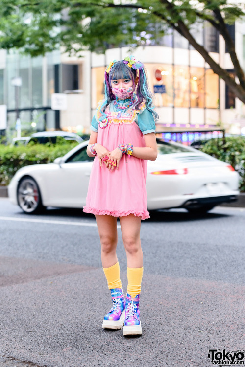 Kawaii Japanese street style personality Emiry on the street in Harajuku with colorful twin tails, a