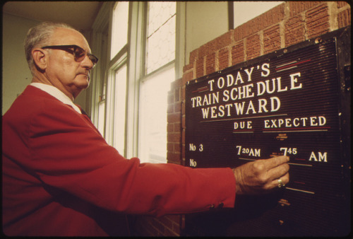 Amtrak station agent at Dodge City, Kansas, places the expected arrival time of the westbound Southw