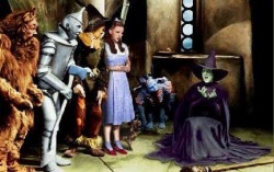 mucholderthen:  VIA one of science fiction writer John Scalzi’s many blog venues  There’s a famous television listing for The Wizard of Oz, written by newspaperman Rick Polito, which goes like this: “Transported to a surreal landscape, a young girl