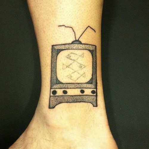 jrflemingtattoo:  A bit skewed in this photo, but stick and poke on the TV. Poke not by me. #tattoo #tattoos
