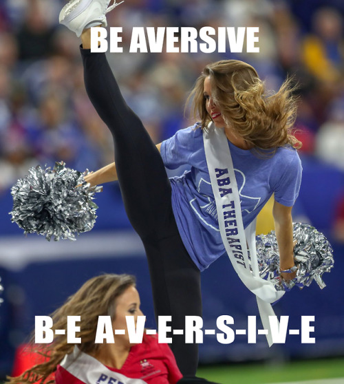 Image: Five memes made from a photograph of a cheerleader on a field, wearing a blue puzzle piece “a
