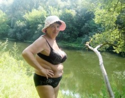 Gorgeous flabby old senior in black lingerie poses down by the pond!Find your sexy old senior here!