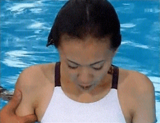 Women Blowing Bubbles Underwater