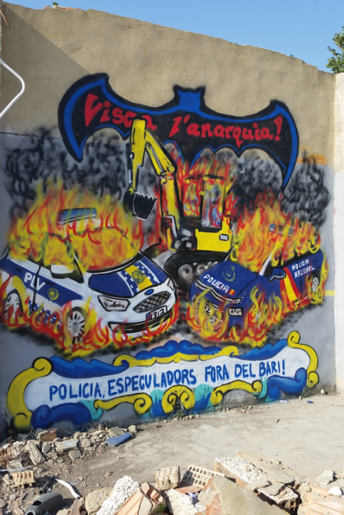 ‘Long Live Anarchy!Police, Speculators Out of the Neighbourood!’Anarchist mural in Valencia, Spain