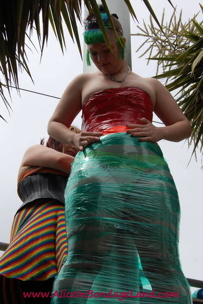 Pride Flag public bondage performance art  with Denali Winter in the Castro neighborhood