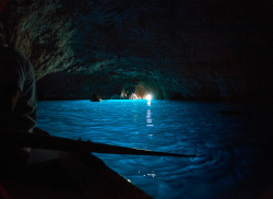 nomadicvision:  Isle of Capri - Blue Glow on Flickr.Via Flickr: Tourists explore the wonder of the Blue Grotto on the Isle of Capri.  Jon &amp; Tina Reid   |    Portfolio    |  Blog  