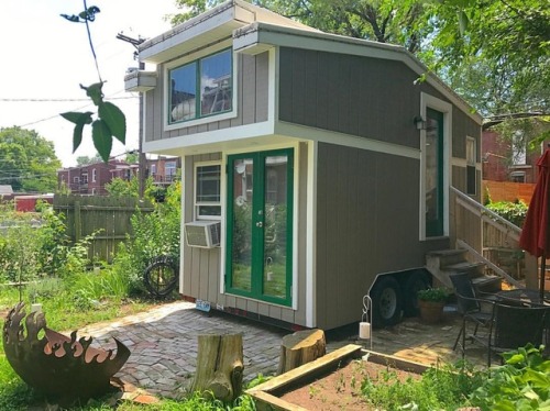 Little Louisa Tiny House has been enjoying these hot summer days in her quaint city yard surrounded 