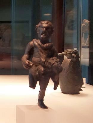 Romano-Germanic MuseumA tiny figurine portraying Priapus wearing a greatcoat. Priapus was a minor ru