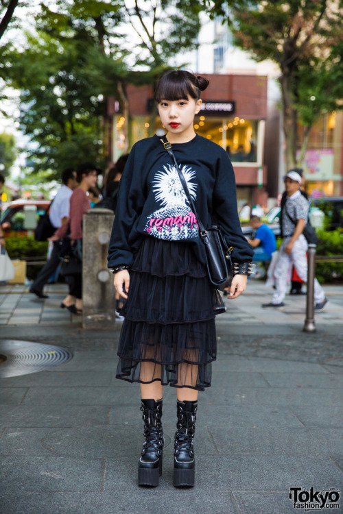 17-year-old Japanese high school student and aspiring artist Beni on the street in Harajuku wearing 
