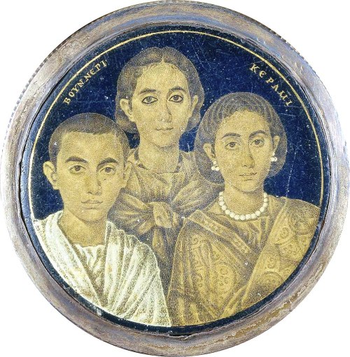 A Roman medallion with a family portrait, from the 3rd century CE. The medallion is mounted on King 