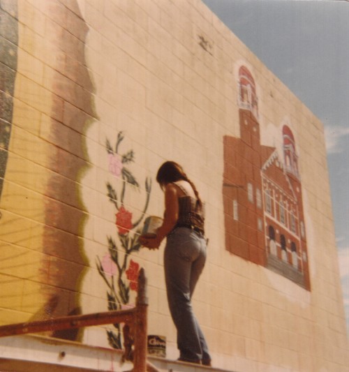 itzelaalejandra:  Ernestina Lopez, painting the roses in the mural 1970 South Central 