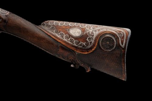A silver inlaid percussion rifle originating from Turkey, mid 19th century.