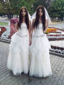 the-fury-of-a-time-lord:  lgbtqblogs:   Two brides have become two of the most kickass women in the world by marrying to protest against homophobia in Russia. Alina Davis, a 23-year-old trans woman, and Allison Brooks, her 19-year-old partner, donned