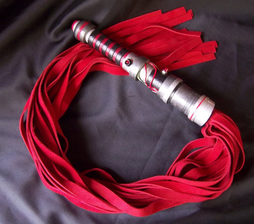 geekydom:  A lightsabre flogger and a Mace Windu Purple cane - Not cheap but utterly awesome! Geek Kink looks awesome - http://www.etsy.com/uk/shop/GeekKink  