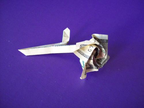 “Money Rose” designed by Sok Song and Seth Friedman.Folded by Annalisa from a US dollar bill (and a 