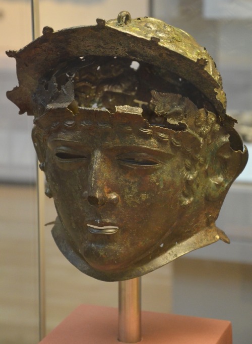 Bronze face-mask helmet of a Roman cavalryman, worn on special occasions.  Artist unknown; late 1st 
