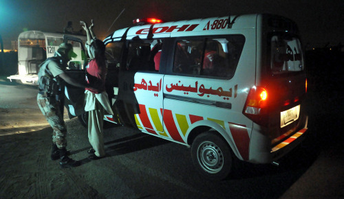 yahoonewsphotos:  Gunmen attack Pakistan airport Gunmen stormed an airport terminal used for VIPs and cargo in Pakistan’s largest city Sunday night, killing five people and wounding another, officials said, striking blow to a city vital to the country’s