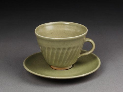  Standard Ware cup and saucer, porcelain with celadon glaze by Bernard Leach, c.1941. 