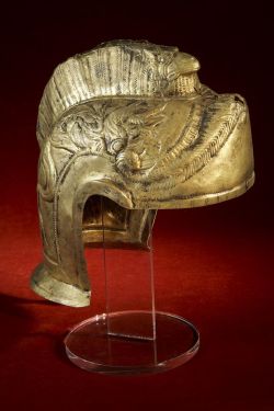 coolartefact:  This spectacular helmet made from a sheet of gilded and beaten copper alloy was made in the early 3rd century AD possibly in the Danube Valley in Central Europe Source: https://imgur.com/GmMuflY