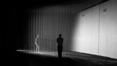 dailyfeatorial:  Rain Room - by rAndom International  Rain Room is a hundred square metre field of falling water through which it is possible to walk, trusting that a path can be navigated, without being drenched in the process. As you progress through