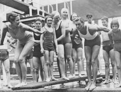 my-retro-vintage: Actor Johnny Weissmuller  of a swimming race, with a group of bathers at the Empire Pool, Wembley, London   Photo by R. Wesley    1934