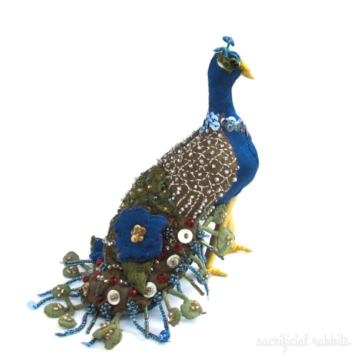 Adorned in leaves and morning glories.
Handmade peacock (available at my etsy if you are so inclined.)