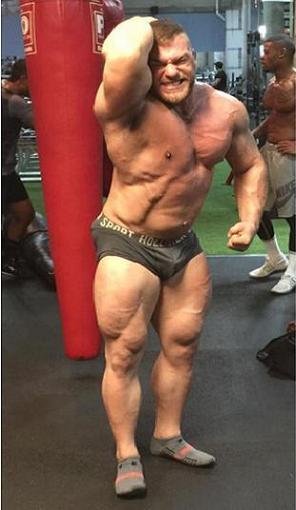 needsize:  Muscle can’t walk by a mirror without a show. Woof!  Fuck! Who is this?
