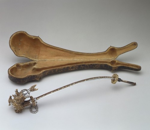 marylibra:Tobacco pipe with caseca. 1740Southern GermanSilver, deer antler, horn, leatherThe deforme