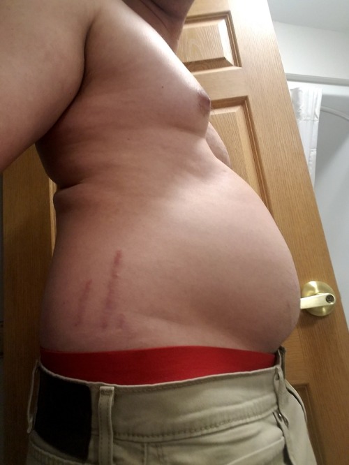 willgainweight4doughnuts:  The next morning aftermath of an all day stuffing the day before.   My belly is starting to get in the way sometimes and every time I bumb it I get reminded I need to eat more.  I might say I’m gettin out of control but I