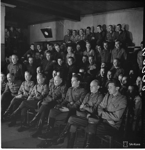 populusfennicapatriam:Soviet prisoners of war watching a show with Finnish officers performed by the