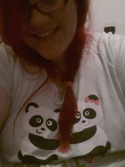 A red panda in a regular panda nightshirt!